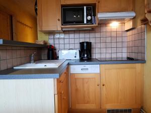 Résidence Les Charmettes - Appartement de charme 2 pièces 4 personnes à Arc 1600 proche des pistes et des commerces MAE-2199