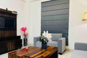 Clazio’ 1 Bedroom Apartment Living Room in Noida