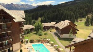 Residence Parc Aux Etoiles - Chalets pour 8 Personnes 154 : photos des chambres