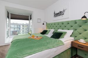 Green Apartment in Gdańsk with Free Access to the Gym and Parking by Renters