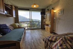 Résidence Les Alpages - Studio skis aux pieds dans une résidence avec piscine extérieure et tennis MAE-2824