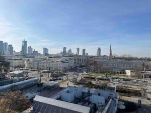 Bright 7th Floor Central Home with Balcony & View