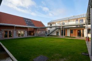 Appart'hotels La Ferme Des Ailleurs : photos des chambres