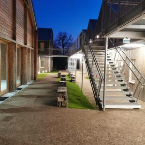 Appart'hotels La Ferme Des Ailleurs : photos des chambres