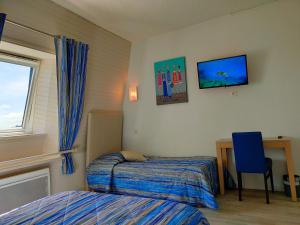 Hotels Hotel le Littoral : Chambre Triple