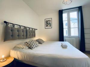Appartements Casa Balzac – T3 : photos des chambres