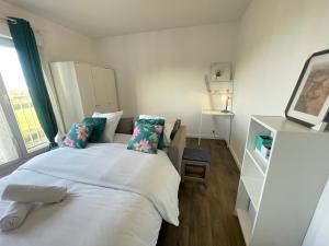 Appartements Les ailes de YourHostHelper : photos des chambres