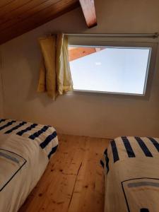 Maisons de vacances Le Nid d-Ocean - Maison cosy avec vue sur mer. : photos des chambres