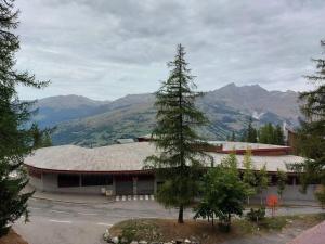 Résidence Aiguille Grive Bat Iii - Appartement 2 pièces 6 personnes en duplex, skis aux pieds, dans le village de Charmettoger à Arc 1800. MAE-6954