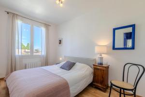 Maisons de vacances L'oranger - Villa avec piscine : photos des chambres