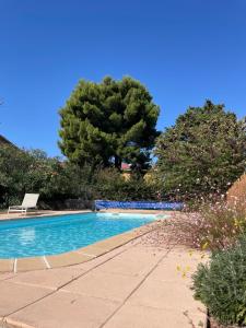 Maisons de vacances L'oranger - Villa avec piscine : photos des chambres