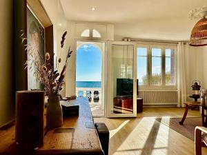 Maisons de vacances Maison grand confort a Doelan, vue mer, acces chemins cotiers et plage, WIFI, parking - FR-1-714-12 : photos des chambres