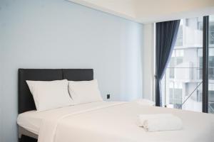 Cozy Stay Studio Apartment for 4 Persons at Carstensz Residence By Travelio