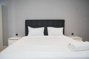 Simply Look Studio Apartment Carstensz Residence By Travelio