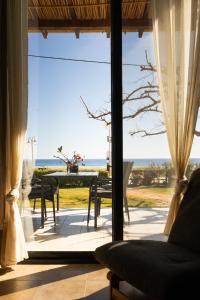 Pelagos Paradise Seafront Villa by Booking Kottas