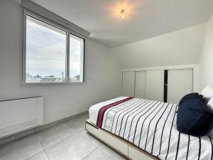 Appartements Le 121 - Appartement 201 : photos des chambres