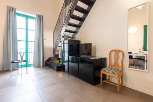 CaseOspitali - Casa Nina, romantico nido in antica corte in centro paese