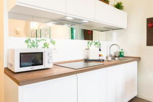 CaseOspitali - Casa Nina, romantico nido in antica corte in centro paese