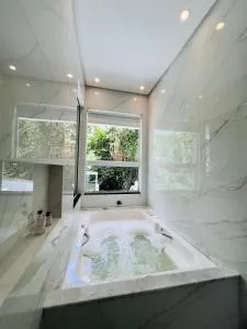 Casa com banheira - تيجوكاس