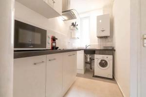 Appartements Le Rouina Eiffel : photos des chambres