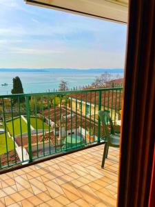 Attico Fronte Lago con Vista Mozzafiato