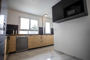 Appartements *Cosy Home 20' Paris 25' Disney - Free WIFI* : photos des chambres