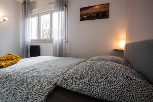 Appartements *Cosy Home 20' Paris 25' Disney - Free WIFI* : photos des chambres