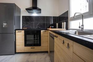 Appartements *Cosy Home 20' Paris 25' Disney - Free WIFI* : photos des chambres