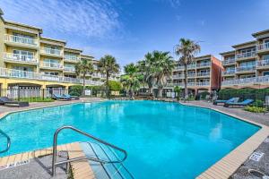 Steps to Galveston Beach Condo with Pool Access