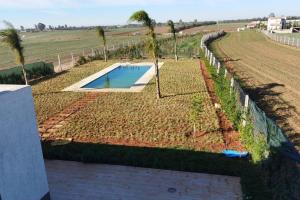 Maison+piscine dans une ferme benslimane