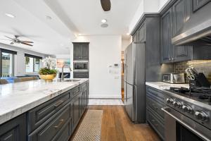 Upscale Home with Rooftop Deck, Jacuzzi, & Firepit