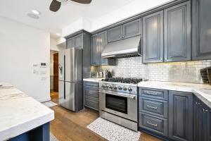 Upscale Home with Rooftop Deck, Jacuzzi, & Firepit