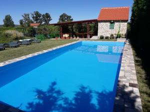 Family friendly apartments with a swimming pool Ljubac, Zadar - 21937