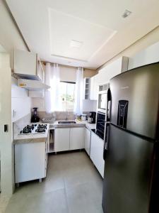 Apartamento confortável ao lado da arena axé moi 3min da praia