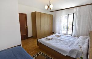 Apartments with parking space Umag - 22473