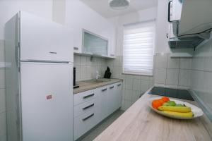 Apartments with a parking space Mastrinka, Ciovo - 22515