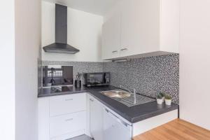 Appartements Logement avec jardin 19min Paris : photos des chambres