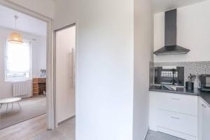 Appartements Logement avec jardin 19min Paris : photos des chambres