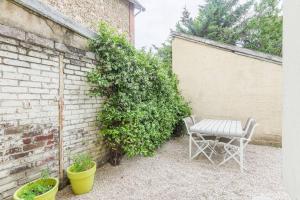 Appartements Logement avec jardin 19min Paris : photos des chambres