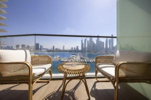 2BR Emaar Beachfront with Full Sea & Skyline Views
