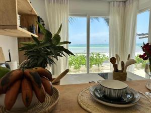 Beachfront White Pearl Suite ZanzibarHouses