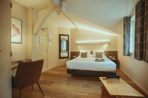 Hotels Auberge de Clochemerle, Spa privatif & restaurant gastronomique : photos des chambres