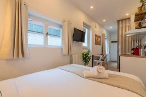 Studio fonctionnel, équipé avec jardin proche gare