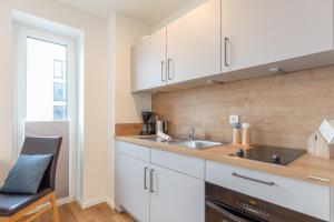 Ferienwohnung Nord-West - direkt am Nordseedeich mit Blick auf den See