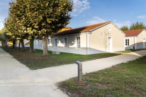 Appartements La Maison Heureuse - Welkeys : photos des chambres