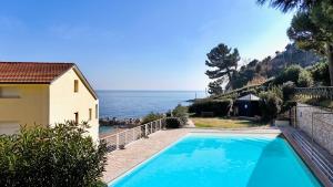 N276 - Numana, bilocale fronte Spiaggiola con piscina