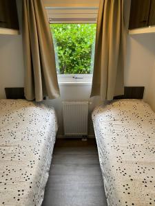 Chalet de Bosrand 404, unieke rustige plek met veel privacy aan de bosrand van vakantiepark op de Veluwe