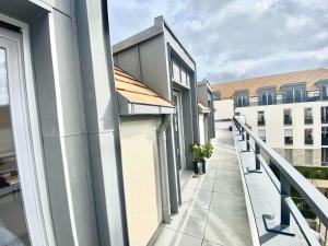 Appartements Le Petit Roof Top : photos des chambres