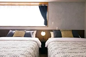 TOMMY CONDOMINIUM WAKASA402 - Kume