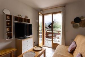 Appartements A Laye station Charmant T1 33 m2 : photos des chambres